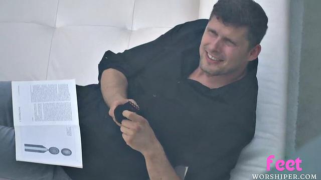 Anal-loving busty cutie gives footjob