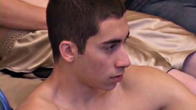 Richard, Skylerr and Kaos watch some porn, grab their crotches, before stripping naked. After passing the lube around, the horny young guys stroke their boners, and then Kaos goes down on Skylerr's cock for a while.