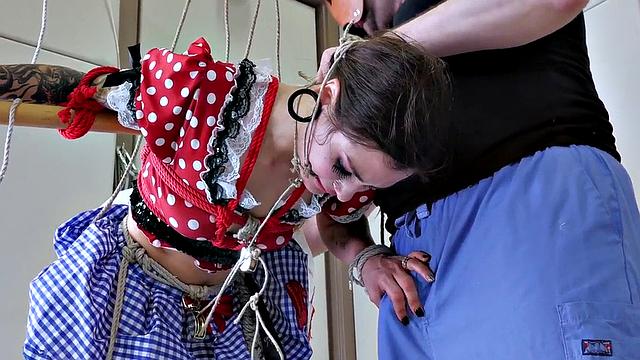 Tied up sub deepthroats dick