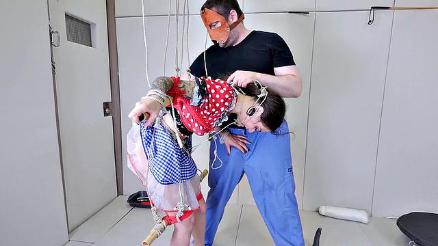 Tied up sub deepthroats dick