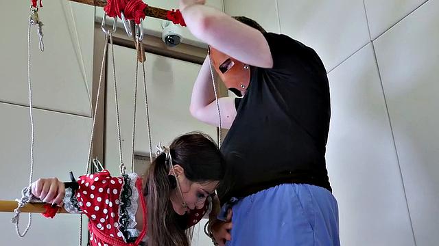 Tied up sub deepthroats dick