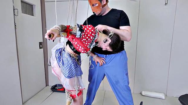 Tied up sub deepthroats dick