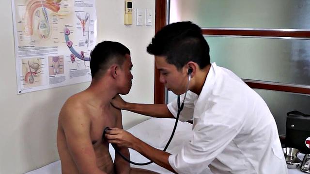 Assravaged asian patient with two doctors