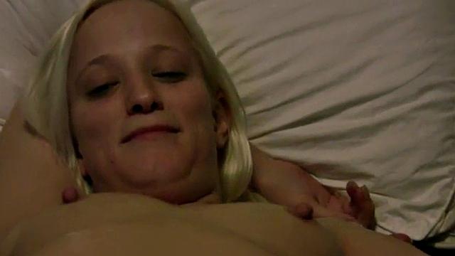 Amateur gives footjob to hard cock in POV