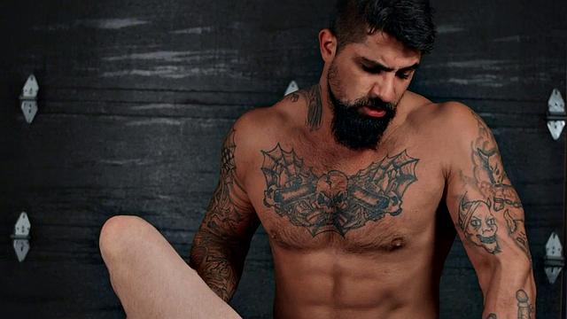 Tattooed hunk fucks nympho in asshole doggystyle