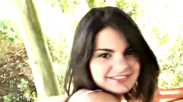 Stripteasing teen removes her clothes