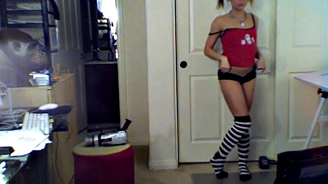 Horny stripteasing teen shows off body