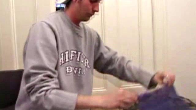 As a porn flick plays, young amateur Aaron Michaels strokes hard, pulls his cock out of his jeans, lets loose, and spills his nut on the bed.