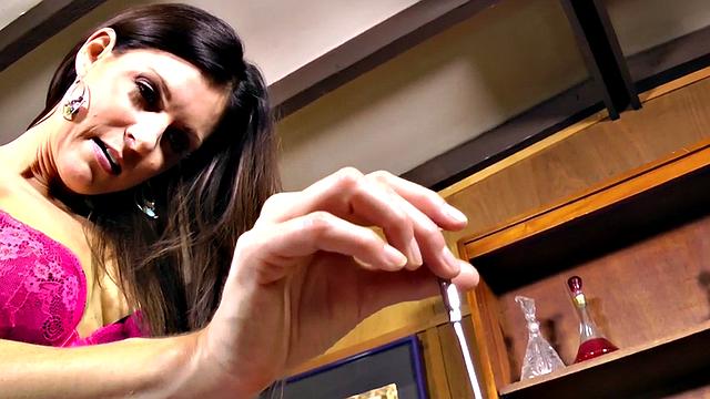 CBT domina in latex torments cock with instrument