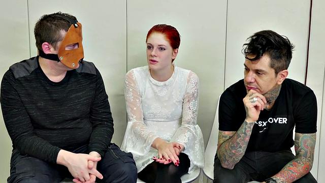 Watch this bald-headed babe gag and toy her masked pussy in bondage