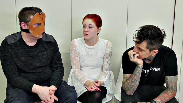 Watch this bald-headed babe gag and toy her masked pussy in bondage