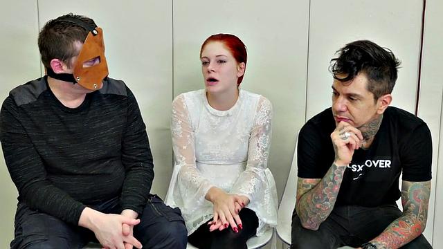 Watch this bald-headed babe gag and toy her masked pussy in bondage