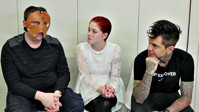 Watch this bald-headed babe gag and toy her masked pussy in bondage