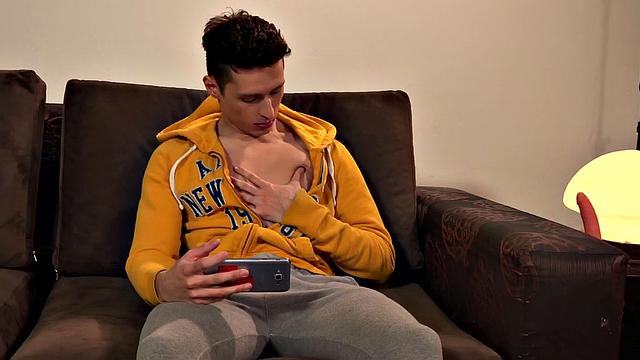 Sonny watches porn on his phone while Francis watches and joins in to beat off.