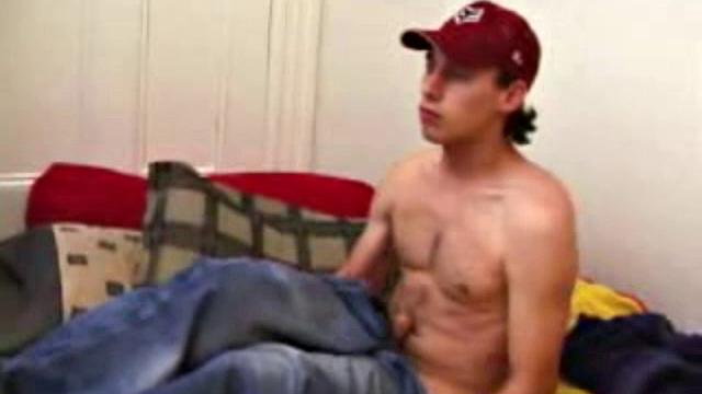 Ricky Underton quickly strips and starts tugging on his dick. He lubes up his ass and shoves a dildo deep inside. Next, he lubes up, and slides it in and out, while stroking his stiff dick.