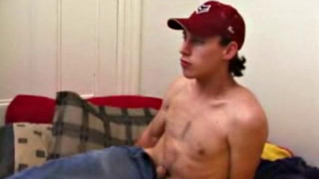 Ricky Underton quickly strips and starts tugging on his dick. He lubes up his ass and shoves a dildo deep inside. Next, he lubes up, and slides it in and out, while stroking his stiff dick.