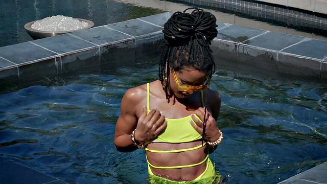 Watch this kinky black babe play with her trimmed pussy in the great outdoors