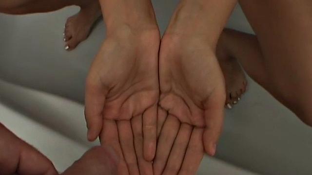 Brunette babe spreads her pussy with pees while her boyfriend watches in the bathroom