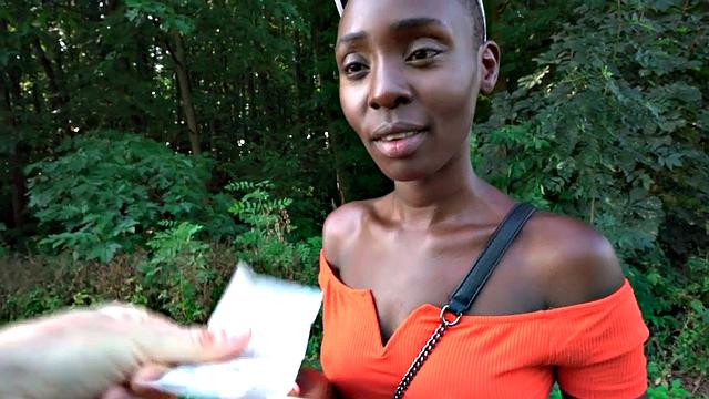 Hairless Ebony gets paid for sucking big dong outdoors