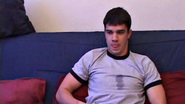 After unbuckling his jeans, Dawson slips off and out pops his stiff dick. He strokes it as he watches some porn.