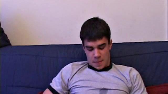 After unbuckling his jeans, Dawson slips off and out pops his stiff dick. He strokes it as he watches some porn.