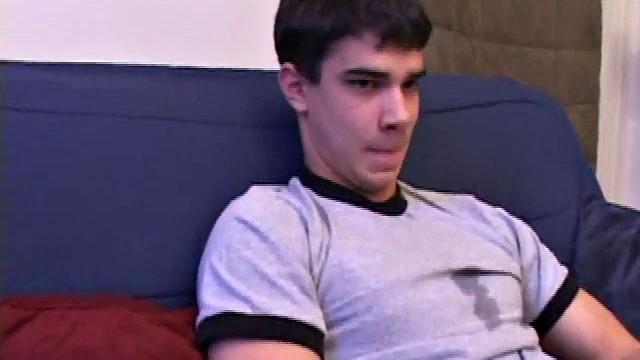 After unbuckling his jeans, Dawson slips off and out pops his stiff dick. He strokes it as he watches some porn.