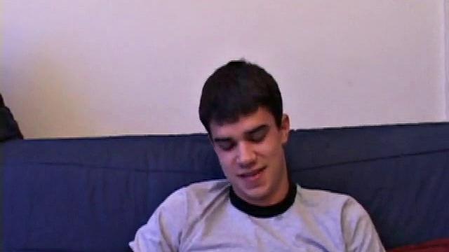 After unbuckling his jeans, Dawson slips off and out pops his stiff dick. He strokes it as he watches some porn.