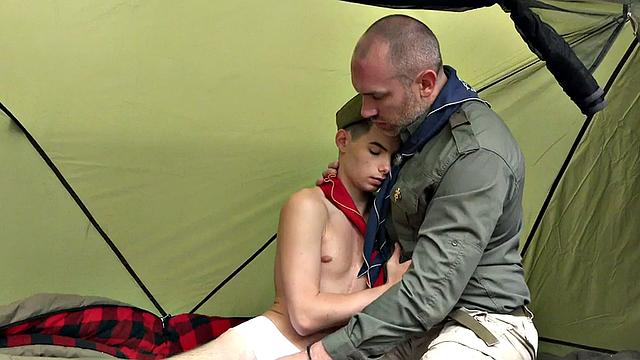 Mature scout drills skinny twink's asshole outdoors in tent