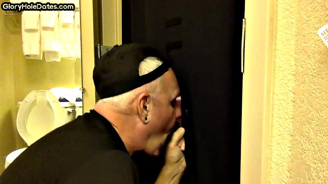Gloryhole amateur DILF sucks and wanks penis at home