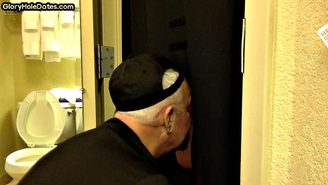 Gloryhole amateur DILF sucks and wanks penis at home