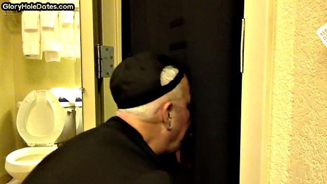 Gloryhole amateur DILF sucks and wanks penis at home