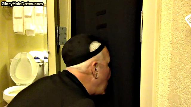 Gloryhole amateur DILF sucks and wanks penis at home