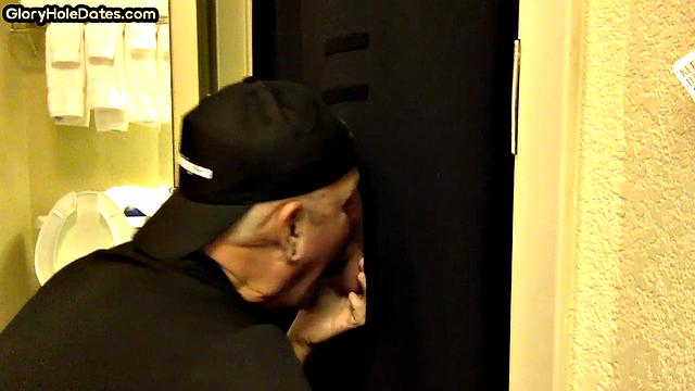 Gloryhole amateur DILF sucks and wanks penis at home
