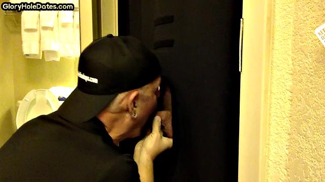 Gloryhole amateur DILF sucks and wanks penis at home