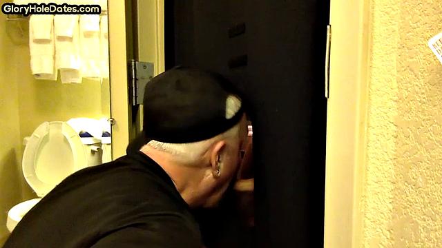 Gloryhole amateur DILF sucks and wanks penis at home