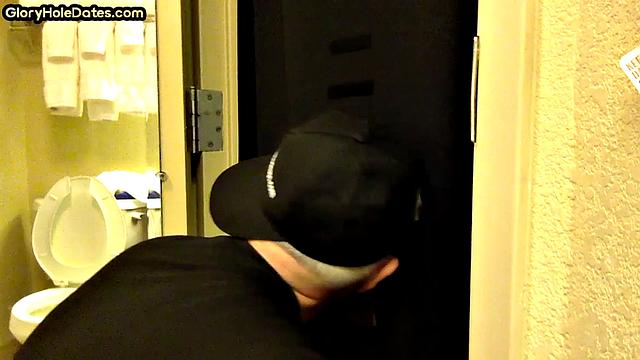 Gloryhole amateur DILF sucks and wanks penis at home