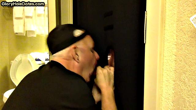 Gloryhole amateur DILF sucks and wanks penis at home