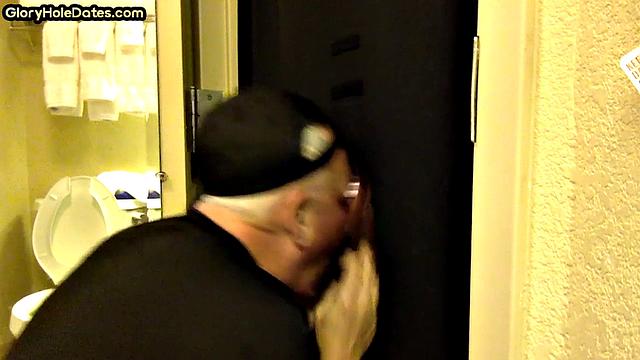Gloryhole amateur DILF sucks and wanks penis at home