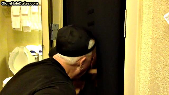 Gloryhole amateur DILF sucks and wanks penis at home