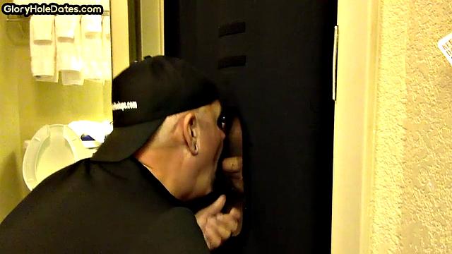 Gloryhole amateur DILF sucks and wanks penis at home