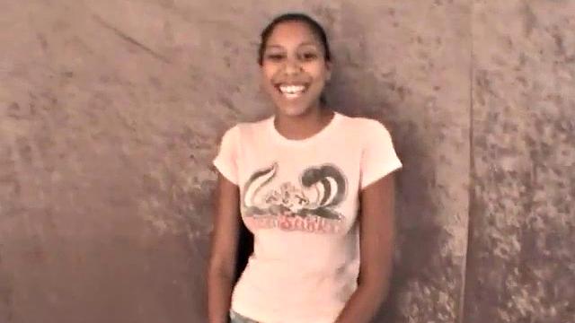 Slim amateur ebony teen fucks her pussy with a dildo in solo