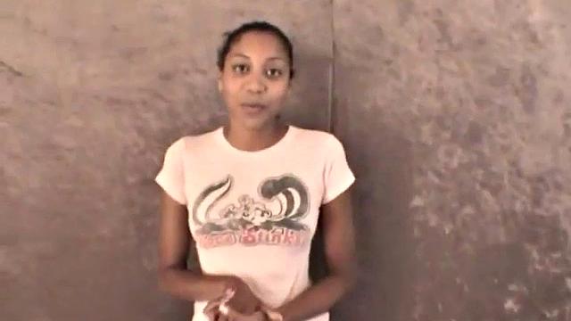 Slim amateur ebony teen fucks her pussy with a dildo in solo