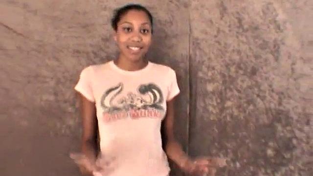 Slim amateur ebony teen fucks her pussy with a dildo in solo