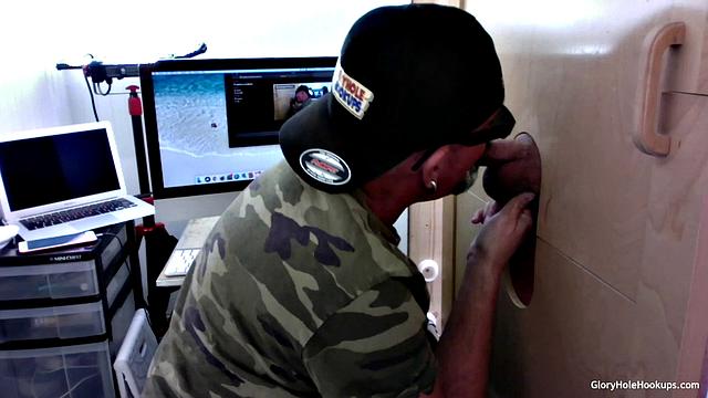 mature guy gets his cock sucked at the gloryhole