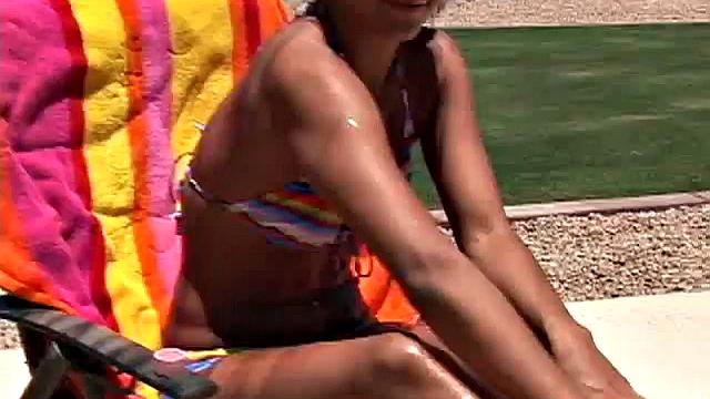 Hot teen sunbathing outdoors in the sun