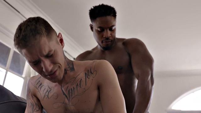 Black jock pounding ass of white tattooed stud at home