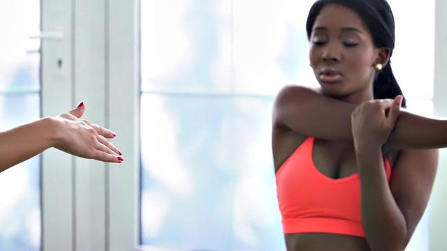 Interracial lesbians having oral fingering at gym