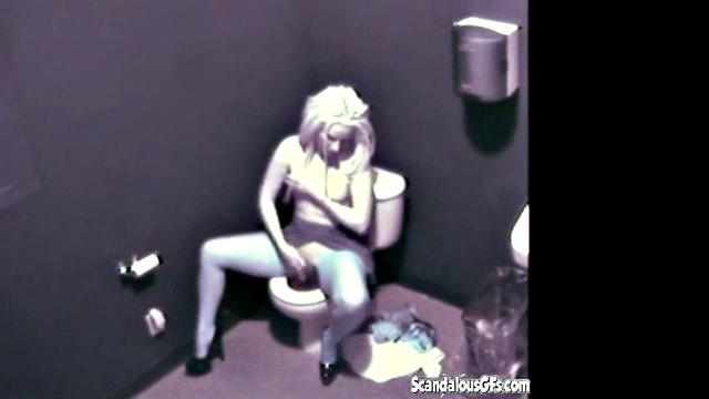Blonde hottie masturbates in public toilet & gets naughty with a voyeur