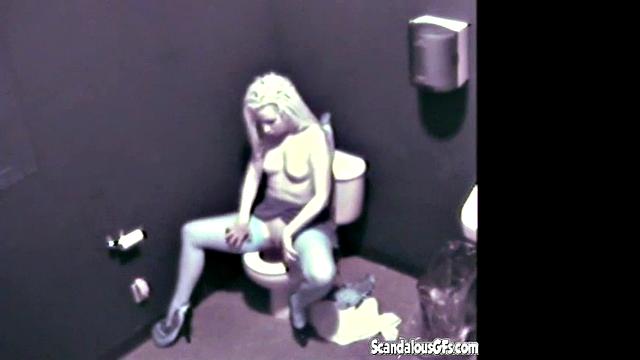 Blonde hottie masturbates in public toilet & gets naughty with a voyeur