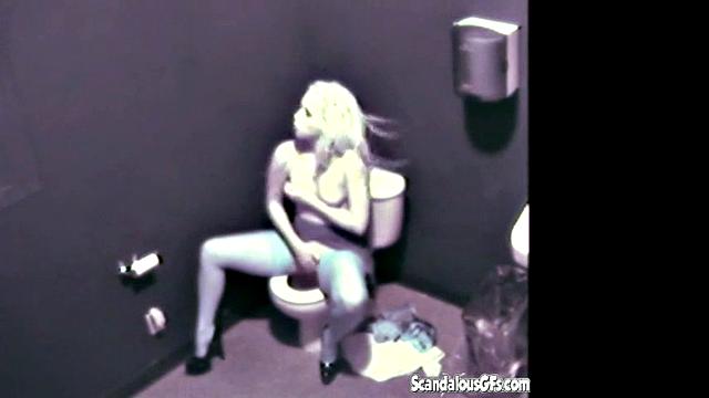 Blonde hottie masturbates in public toilet & gets naughty with a voyeur